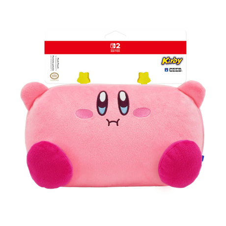 A pink Kirby plush pillow with a sad face, shown in its original retail packaging. The packaging features a red Nintendo Switch 2 logo at the top and a Kirby Media logo on the right.