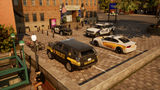 A video game render showing several police cars parked in a city plaza outside a brick building. The most prominent vehicle is a black SUV with yellow 'BRISTON' markings and 'POLICE' text, with other cars in white and gray police livery nearby.
