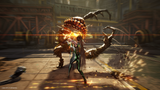A stylized action scene showing a female fighter in a green and black bodysuit facing off against a large, spiky monster in an industrial interior. The image has dramatic lighting, motion blur, and glowing orange energy effects, with a visible Capcom watermark in the bottom-left corner.
